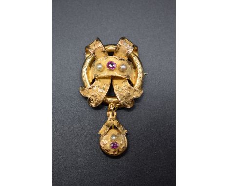 A Victorian yellow metal pearl and amethyst pendant brooch, 6.5cm. 