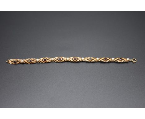 A 9ct gold garnet and pearl bracelet, 18cm, 13g gross weight. 