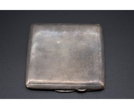 An engine turned silver cigarette case, by&nbsp;John Rose, Birmingham 1946, 8.4cm, 94g all in. 