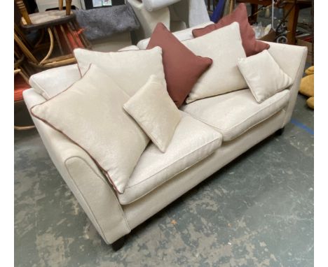 A modern two seater beige sofa, approx 178cmW