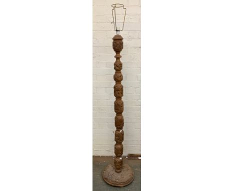 A carved hardwood standard lamp, 150cmH
