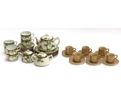 A set of six early 20th century Japanese Satsuma coffee cups (5.5cmH, marked to base) and saucers; together with a bamboo and