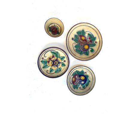 Four pieces of early Poole pottery to include two Carter, Stabler Adams pieces, the largest footed bowl in rare 'RH' pattern 