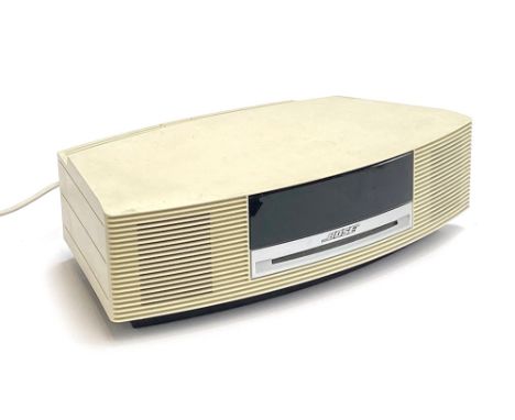 A Bose Wave CD player with remote