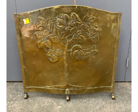 A brass fire screen decorated with a tree, 67x66cm
