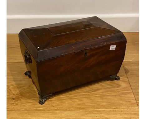 A Regency mahogany tea caddy of sarcophagus form, with twin metal handles, and cast paw feet, (AF), 34x21.5cmx21cmH