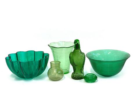 A quantity of green glass, to include large fruit bowl of scalloped form, 31.5cmD, 20th century decanter in the form of an ea