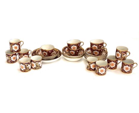 A Worcester (Barr) part tea service, brown ground painted with flowers, comprising saucers, teacups and coffee cans, 29 piece