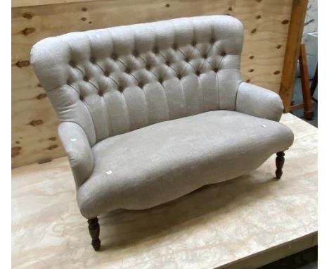 A button upholstered two seater settle, of recent manufacture, approx 126cmW