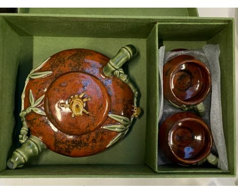 A mixed lot to include Chinese bamboo style teapot and teacups, five noodle bowls with chopstick rests, bamboo vase, stonewar