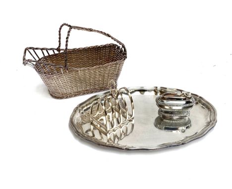 A Christofle silver plated wine basket, a silver plated toast rack, oblong tray, and Ronson table lighter (4)