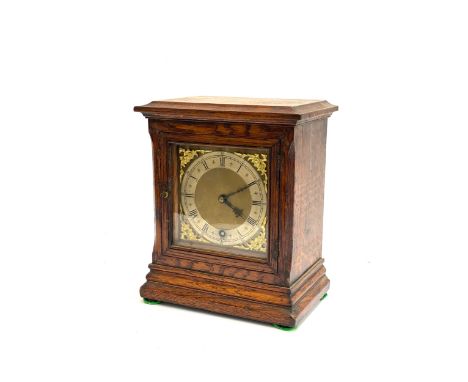 A 20th century oak mantle clock, the movement marked W&amp;B Sch, 25cmH