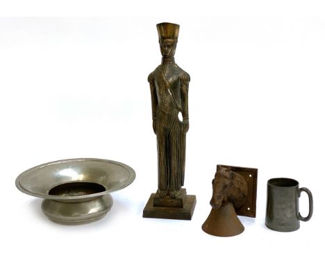 An Eastern white metal spittoon, 34cmD, a cast metal fire tool holder in the form of a soldier, a cast iron bell in the form 