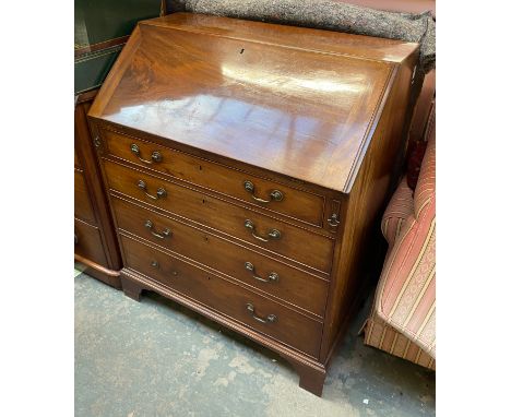 A George III mahogany bureau, fall fronted opening to a fitted interior, over four graduating drawers on bracket feet, 92x54x