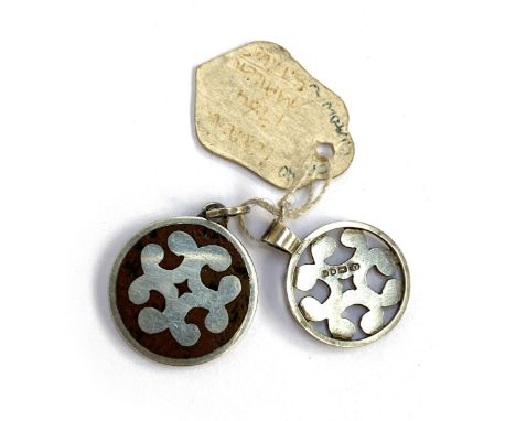 Two silver Celtic style cross pendants, one f pierced design, 1.7cmD, hallmarked SJH, London, 1982,&nbsp; the other with agat