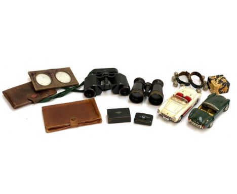 A mixed lot to include a pair of Carl Zeiss Jena Jenoptem 8x30 binoculars, and one other, a Burago Cobra 427 1/24 scale model