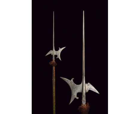 dating: circa 1600 provenance: Italy, Long cusp of lozenge section, concave-edged axe, lugs and piercing, oblique rear fluke,