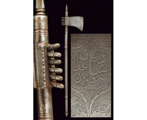 dating: 19th Century provenance: Indopersia, Iron axe, slightly convex, borders decorated with notches and facets engraved wi