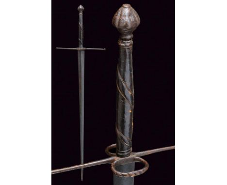 dating: circa 1600 provenance: North Italy, Wide, straight blade of lenticular section; iron mounts, large, straight quillon,