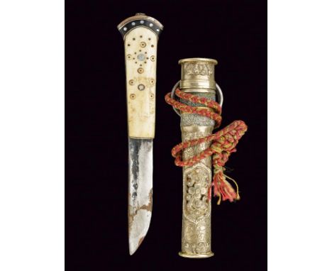 dating: circa 1900 provenance: Tibet, Straight, single-edged blade. Grip with bone grip scales, decorated with circles. Pomme