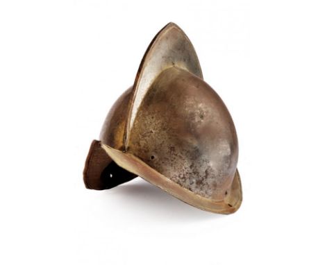 dating: circa 1600 provenance: Germany, Skull in two halves. Medium-high comb, slightly cusped in the center. No rivets. Brim