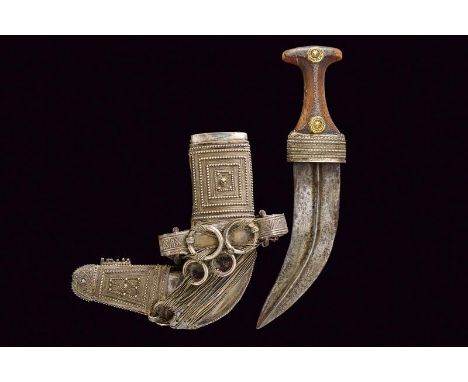 dating: 1900 provenance: Arabian Peninsula, Wide, curved, double-edged blade with central raiser. Wooden grip, decorated with