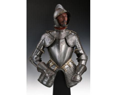 dating: about 1580 provenance: North Italy, Helmet with skull in one piece, surmounted with medium-high comb, with twisted bo