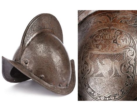 dating: Late 16th Century provenance: Germany, Iron skull in two halves, joined in the center. Medium high comb with file-rop