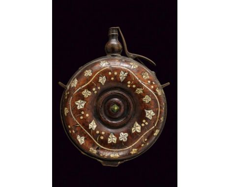 dating: 17th Century provenance: Germany, Circular, wooden body, with bone inlays depicting vine shoots. Brass, external band