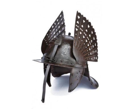 dating: 17th Century provenance: Poland, Skull in one piece, adorned with sunburst fluted decorations, with a circular plate 