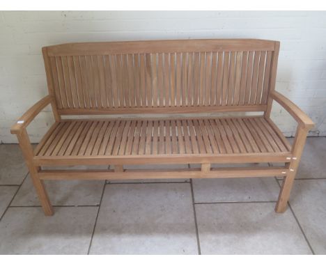 A good quality teak bench boxed 150cm wide 