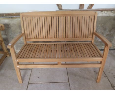 A teak garden bench 120cm wide 
