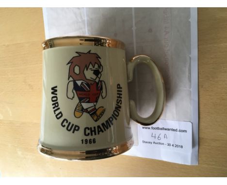 WC Willie 1966 Ceramic Football Tankard: Stunning cream mug with gold rims featuring WC Willie one side and the World Cup log