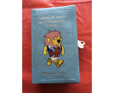 1966 World Cup Willie Book Style Money Box: Light blue Money Box. Made to look like a small book with WC Willie to front and 