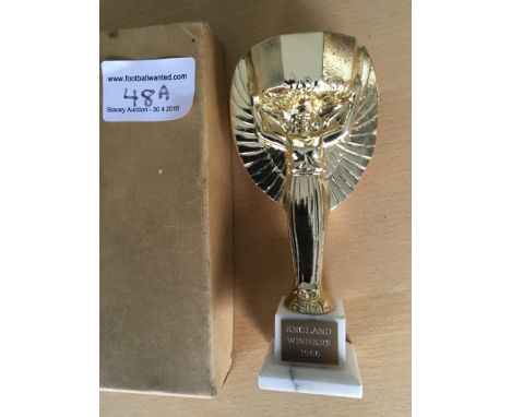 Jules Rimet 1966 England Winners Trophy: Heavy metal measuring 7.5 inches high. Plaque states England Winners 1966. Nice item