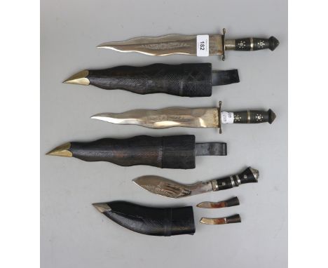 2 x 'Kris' or 'Flame' bladed Kukhris, plus smaller version with accessory blades 