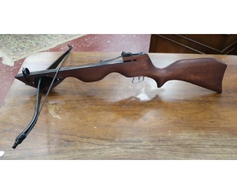 Crossbow together with 5 bolts 