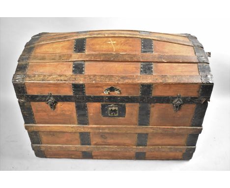 A Late 19th/Early 20th Century Iron Mounted Dome Topped Traveling Trunk with Leather Carrying Handles, 81cm Long 