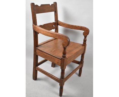 A Pitch Pine Ladder Back Armchair 