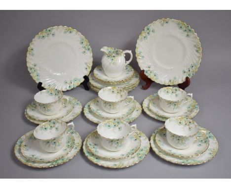 An Edwardian Crown Staffordshire Blue Floral Decorated Tea Set to comprise Six Cups, Nine Saucers, Side Plates, Two Cake Plat