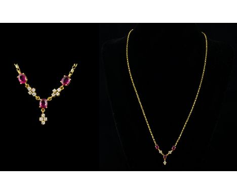 18ct Gold Ruby And Diamond Set Pendant Necklace Long fine link gold belcher chain necklace with Y-form central drop set with 