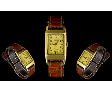 Early 20th Century Gents 18ct Gold Wristwatch Tank style case with rectangular dial, Arabic numerals, subsidiary second, mark