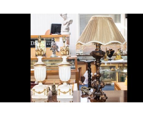 Modernist Gilt Standard Lamp With frosted glass shade. Together with gilt onyx standard lamp fitted with peach satin tassel t