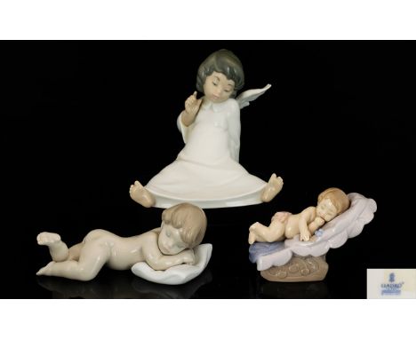 A Collection of Lladro and Nao Porcelain Figures ( 3 ) All 1st Quality and Mint Condition. Comprises 1/ Wondering Cherub. Mod