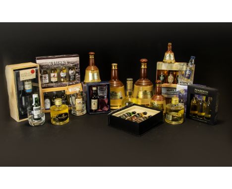 A Mixed Collection Of Whisky Gift Packs And Commemorative Bottles To include four empty collectable bells 'Bell' bottles, var