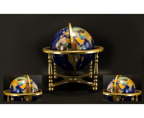 Decorative Gemstone Globe Gilt framed globe inlaid with various semi precious stones and gold tone lines of latitude and long