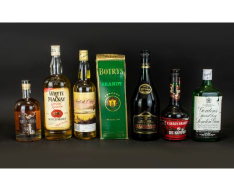 A Collection Of Alcoholic Drinks - Seven In Total. Comprising, Napoleon French Brandy Bardinet, Cherry Brandy De Kuyper, Toff