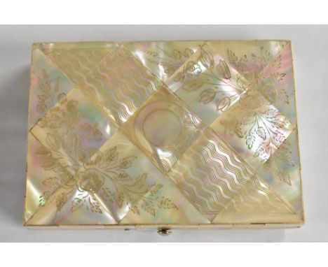 A 19th century mother of pearl rectangular visiting card case, veneered overall with lozenges and engraved with an engine-tur