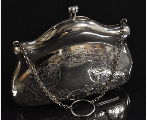 A silver evening purse, chased scrolling foliate decoration, vacant cartouche, chain and finger ring, Birmingham 1819