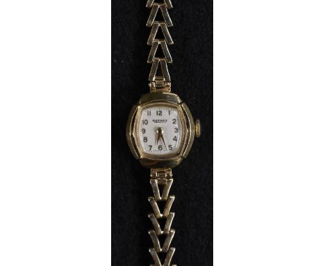 Rotary - a lady's 9ct gold bracelet watch, cream cushion dial, Roman numerals, minute track, manual movement, ornate 9c gold 